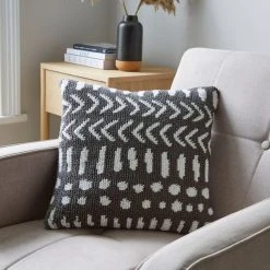 Dunelm Circular Knit Arrows Cushion